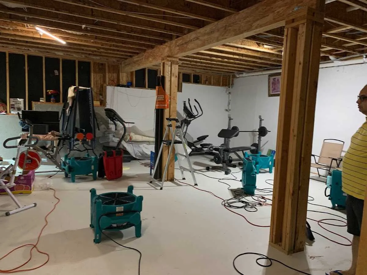 Basement drying equipment setup for Contents Cleaning & Restoration in DeWitt
